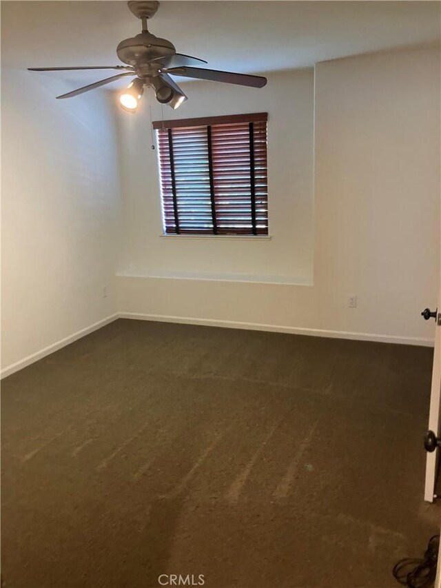 1830 Nevada St, Gridley, CA 95948 - spare room featuring a ceiling fan and dark carpet