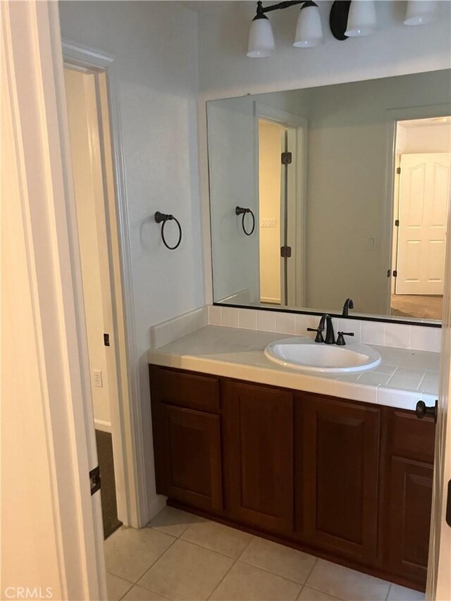 1830 Nevada St, Gridley, CA 95948 - bathroom with vanity and tile patterned floors