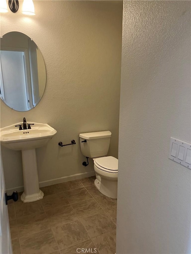1830 Nevada St, Gridley, CA 95948 - bathroom with toilet and tile patterned floors