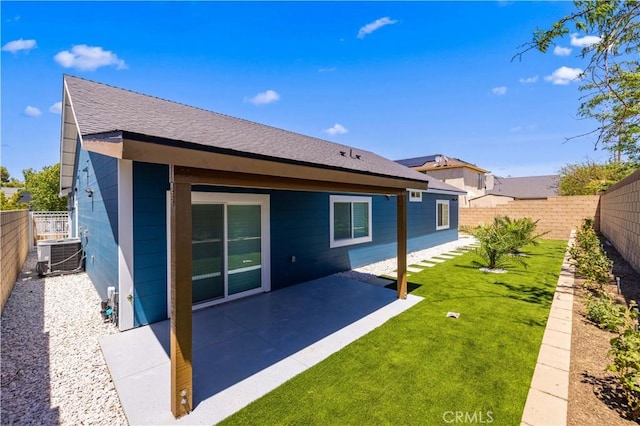 3838 Balmont St, Lancaster, CA 93536 - rear view of property featuring a fenced backyard, a patio, and a shingled roof