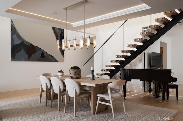642 Via Lido Nord, Newport Beach, CA 92663 - dining space with stairs, wood finished floors, a tray ceiling, and a chandelier