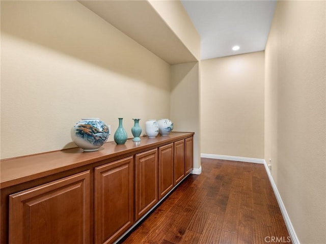 7219 Evening Star Rose Ct, Oak Hills, CA 92344 - corridor with dark wood finished floors and recessed lighting