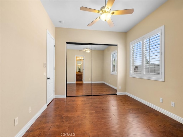 7219 Evening Star Rose Ct, Oak Hills, CA 92344 - unfurnished bedroom featuring wood finished floors, a closet, and a ceiling fan