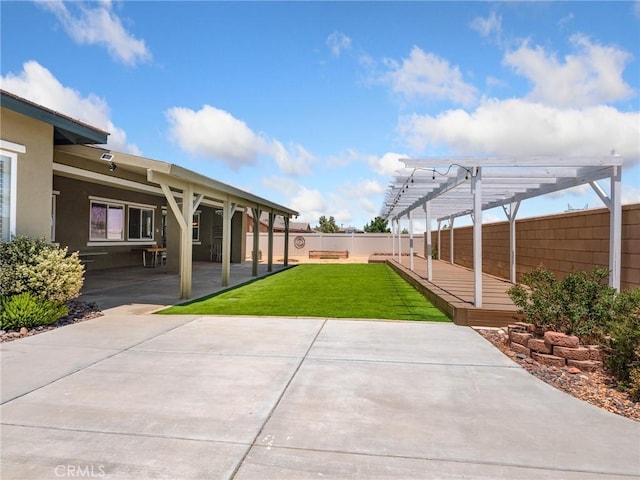 7219 Evening Star Rose Ct, Oak Hills, CA 92344 - fenced backyard with a pergola and a patio
