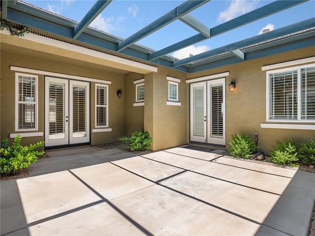 7219 Evening Star Rose Ct, Oak Hills, CA 92344 - view of patio with french doors