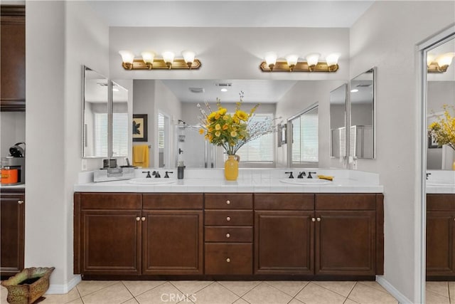 1341 Stanfill Rd, Palmdale, CA 93551 - bathroom featuring double vanity, tile patterned floors, and a stall shower
