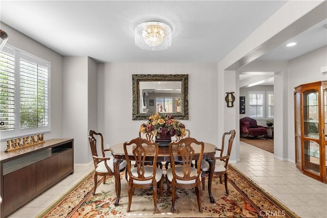 1341 Stanfill Rd, Palmdale, CA 93551 - dining room featuring light tile patterned flooring and a chandelier