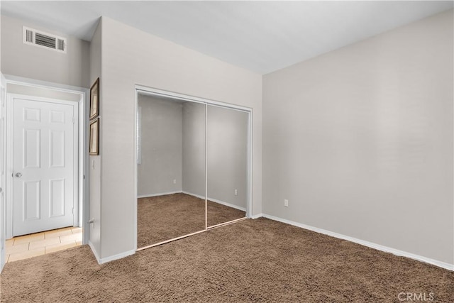 1341 Stanfill Rd, Palmdale, CA 93551 - unfurnished bedroom featuring carpet flooring and a closet
