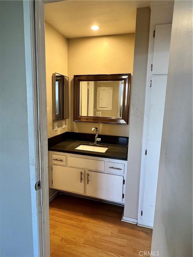 525 N Sycamore Ave Unit 304, Los Angeles, CA 90036 - bathroom featuring wood finished floors and vanity