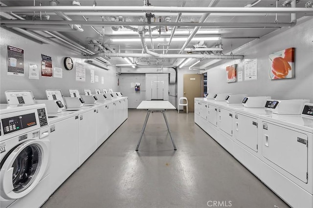 525 N Sycamore Ave Unit 304, Los Angeles, CA 90036 - shared laundry room with independent washer and dryer and a garage
