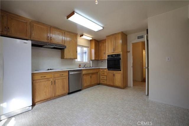 5519 Stevely Ave, Lakewood, CA 90713 - kitchen featuring freestanding refrigerator, dishwasher, oven, and light countertops