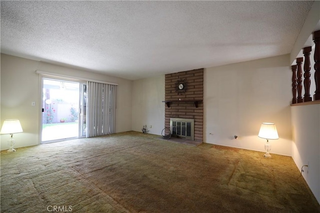 5519 Stevely Ave, Lakewood, CA 90713 - unfurnished living room with carpet, a textured ceiling, and a brick fireplace