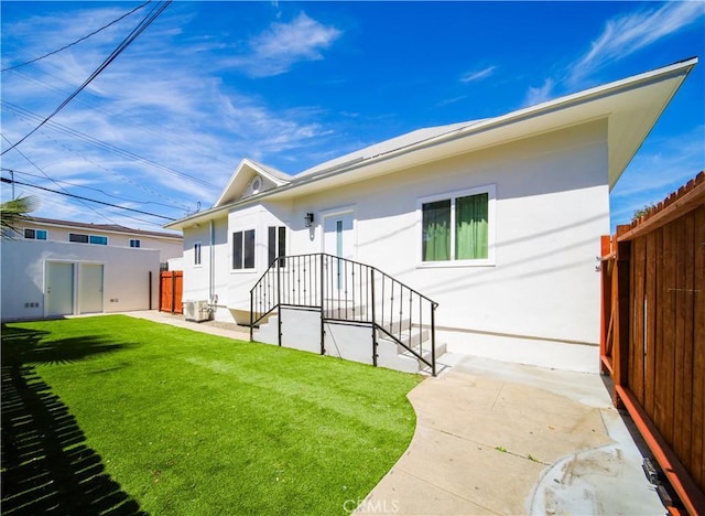 1113 Pacific Ave, Long Beach, CA 90813 - rear view of property featuring stucco siding and a patio area