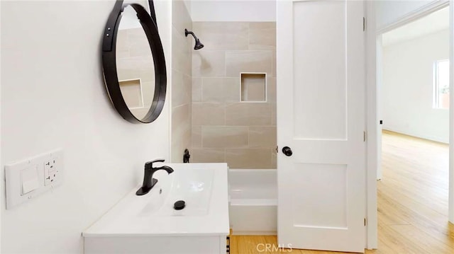 1113 Pacific Ave, Long Beach, CA 90813 - full bathroom with vanity, wood finished floors, and shower / bathtub combination