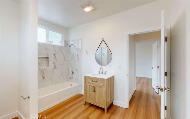 1113 Pacific Ave, Long Beach, CA 90813 - bathroom with vanity, wood finished floors, and bathtub / shower combination