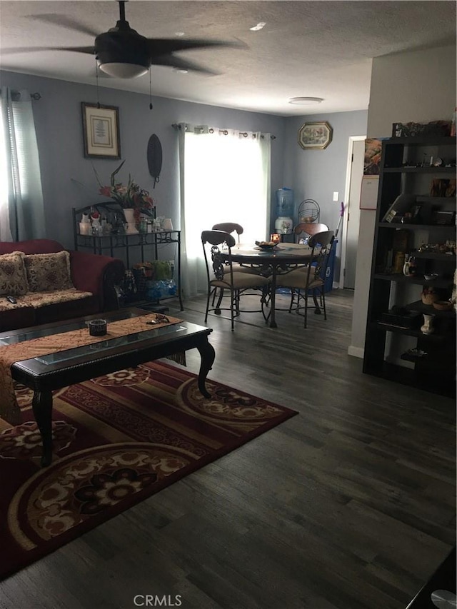 16472 Vine St, Hesperia, CA 92345 - living room with a ceiling fan, wood finished floors, and a textured ceiling