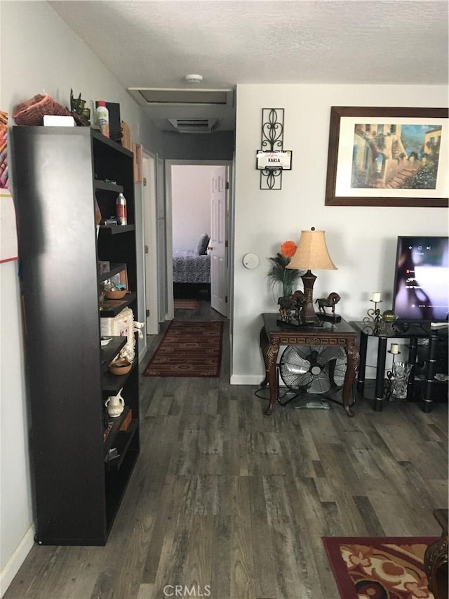 16472 Vine St, Hesperia, CA 92345 - hall featuring wood finished floors and attic access