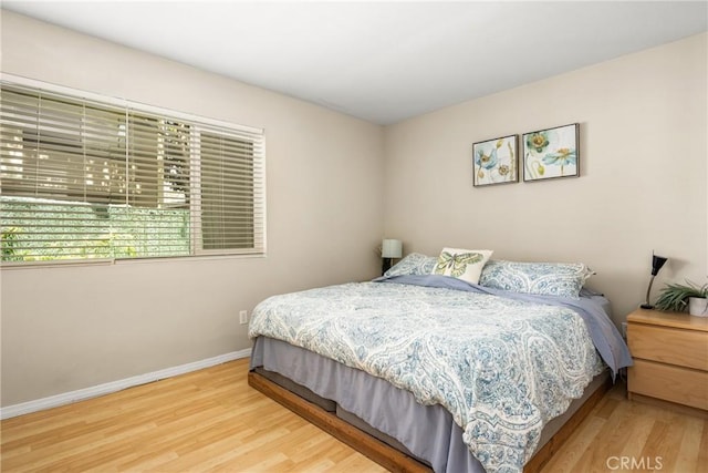 400 Brighton Spgs, Costa Mesa, CA 92627 - bedroom with wood finished floors and baseboards