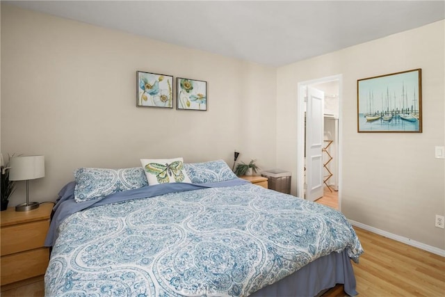 400 Brighton Spgs, Costa Mesa, CA 92627 - bedroom with light wood-type flooring and baseboards