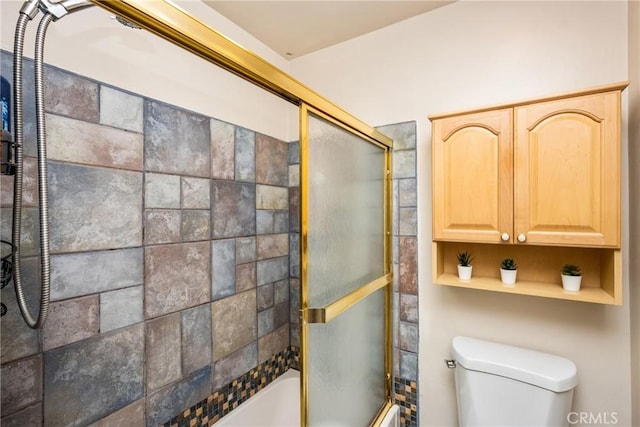 400 Brighton Spgs, Costa Mesa, CA 92627 - bathroom featuring toilet and shower / bath combination with glass door