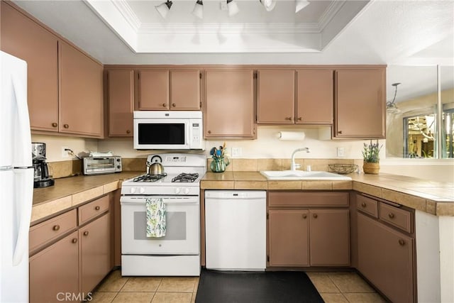 400 Brighton Spgs, Costa Mesa, CA 92627 - kitchen with white appliances, a tray ceiling, light tile patterned floors, a peninsula, and light countertops