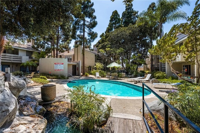 400 Brighton Spgs, Costa Mesa, CA 92627 - community pool featuring a patio area and a residential view
