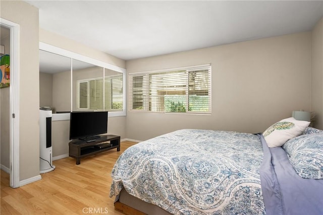 400 Brighton Spgs, Costa Mesa, CA 92627 - bedroom with wood finished floors and a closet