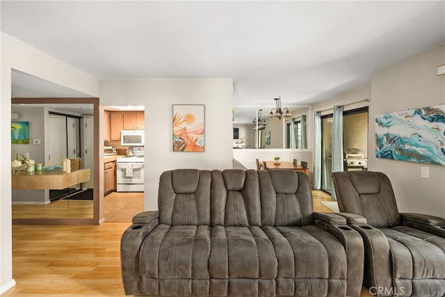 400 Brighton Spgs, Costa Mesa, CA 92627 - living room with a chandelier and light wood finished floors