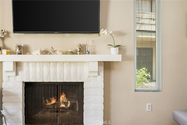 400 Brighton Spgs, Costa Mesa, CA 92627 - detailed view of a warm lit fireplace
