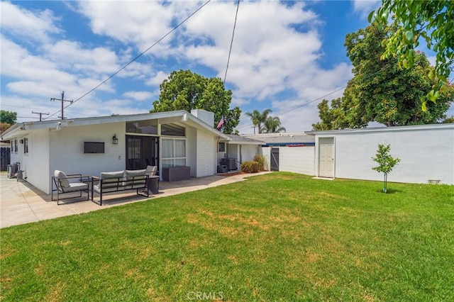 1925 W Beacon Ave, Anaheim, CA 92804 - back of property featuring an outdoor hangout area, a patio area, and a yard