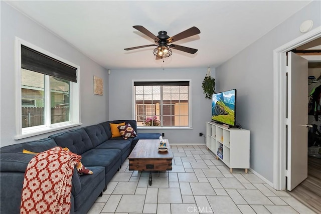 22989 Pine Ln, Crestline, CA 92325 - living room featuring ceiling fan and light tile patterned floors