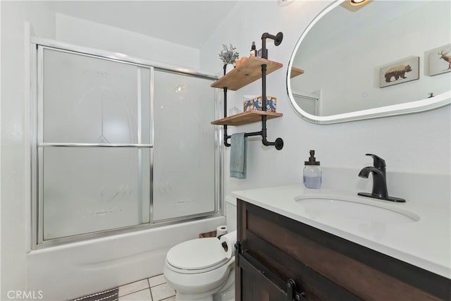 22989 Pine Ln, Crestline, CA 92325 - bathroom with vanity, combined bath / shower with glass door, and tile patterned flooring