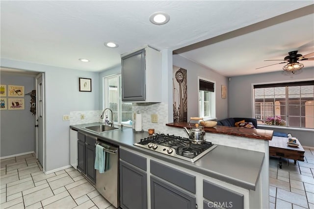 22989 Pine Ln, Crestline, CA 92325 - kitchen with appliances with stainless steel finishes, gray cabinets, ceiling fan, and recessed lighting