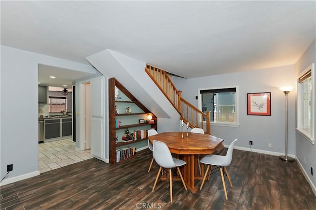 22989 Pine Ln, Crestline, CA 92325 - dining room with wood finished floors and stairway
