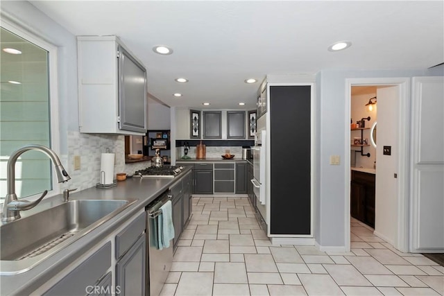 22989 Pine Ln, Crestline, CA 92325 - kitchen with gray cabinets, appliances with stainless steel finishes, tasteful backsplash, recessed lighting, and dark countertops