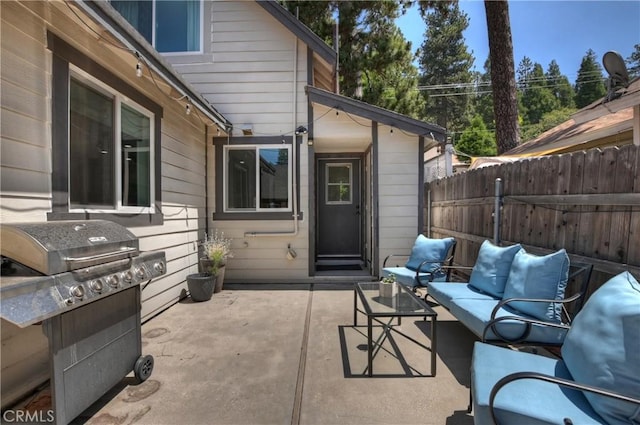 22989 Pine Ln, Crestline, CA 92325 - view of patio / terrace with an outdoor living space and area for grilling