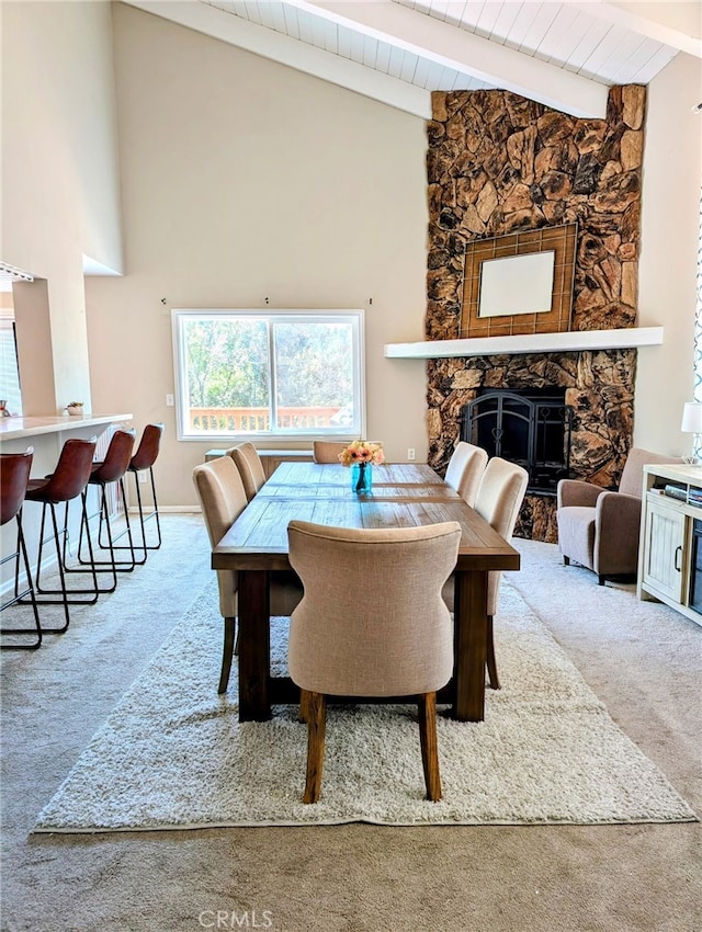 29289 Lake View Dr, Cedar Glen, CA 92321 - carpeted dining room featuring a fireplace, high vaulted ceiling, and a wooden ceiling with exposed beams