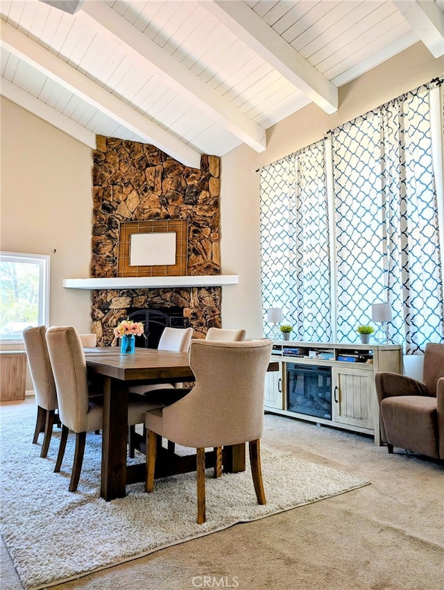 29289 Lake View Dr, Cedar Glen, CA 92321 - dining area with a fireplace, carpet flooring, and wood ceiling