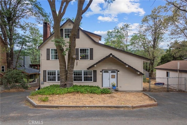29289 Lake View Dr, Cedar Glen, CA 92321 - traditional-style house featuring a chimney