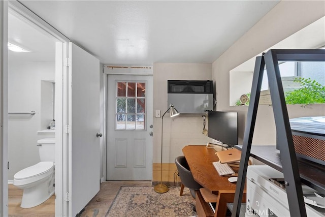 29289 Lake View Dr, Cedar Glen, CA 92321 - home office featuring healthy amount of natural light and wood finished floors