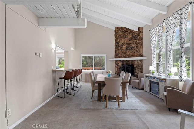 29289 Lake View Dr, Cedar Glen, CA 92321 - carpeted dining space featuring a fireplace and wood ceiling