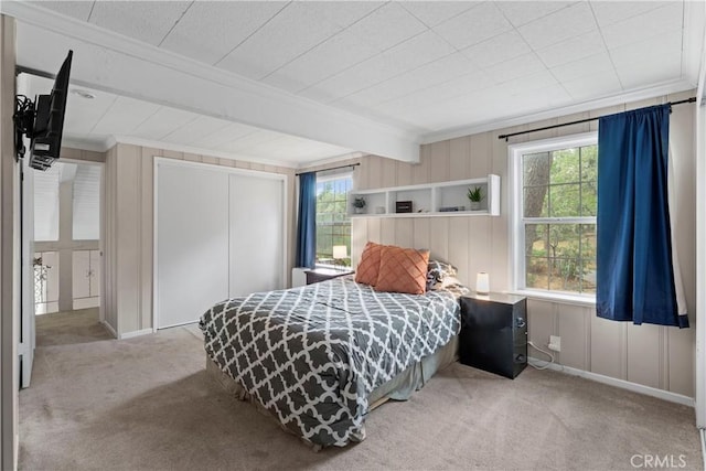 29289 Lake View Dr, Cedar Glen, CA 92321 - bedroom with ornamental molding, carpet flooring, multiple windows, a closet, and beamed ceiling