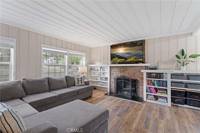 29289 Lake View Dr, Cedar Glen, CA 92321 - living room featuring wood finished floors, a fireplace, and crown molding
