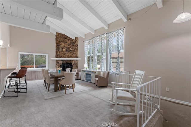 29289 Lake View Dr, Cedar Glen, CA 92321 - dining room featuring high vaulted ceiling, a fireplace, a wooden ceiling with exposed beams, and carpet flooring