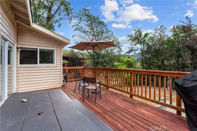 29289 Lake View Dr, Cedar Glen, CA 92321 - wooden deck featuring a grill