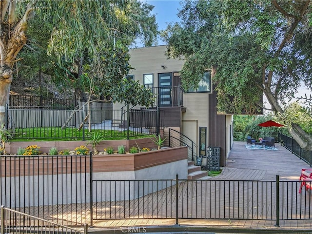 2315 Loma Vista Pl, Los Angeles, CA 90039 - view of front of property with a fenced backyard and a wooden deck