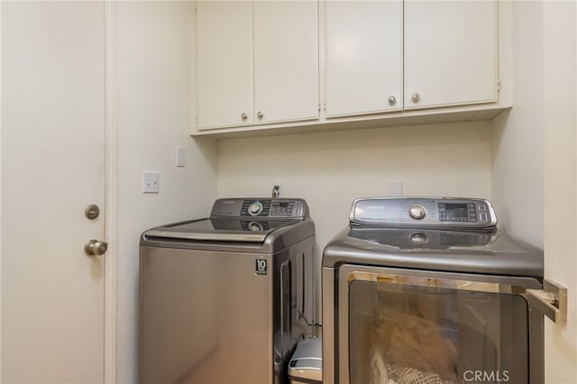 15535 Mallory Ct, Moorpark, CA 93021 - laundry area with washing machine and clothes dryer and cabinet space