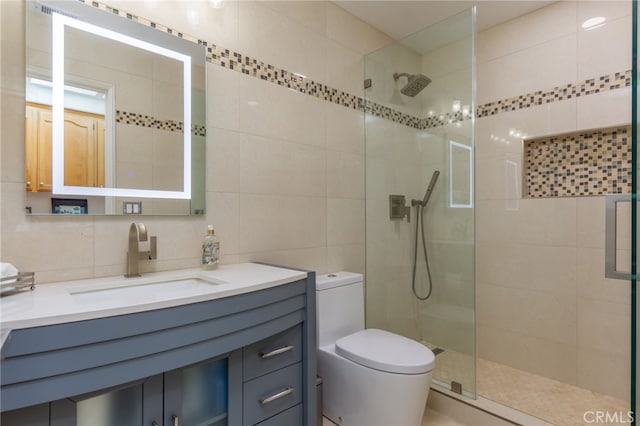 15535 Mallory Ct, Moorpark, CA 93021 - bathroom with vanity, walk in shower, and tile walls