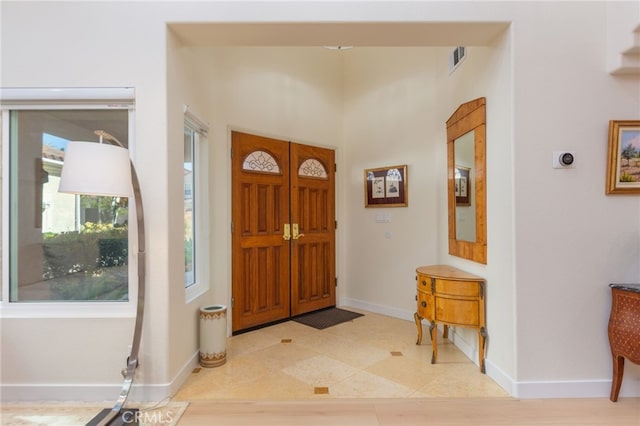 15535 Mallory Ct, Moorpark, CA 93021 - foyer entrance with baseboards and light tile patterned floors