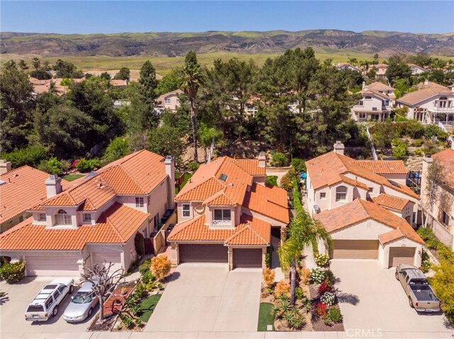 15535 Mallory Ct, Moorpark, CA 93021 - aerial view of residential area featuring a mountainous background
